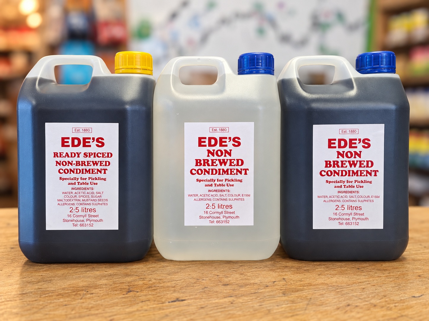 The three Ede's pickling liquors on the counter at Roots and Vines: clear, dark and ready spiced, 2.5 litres each